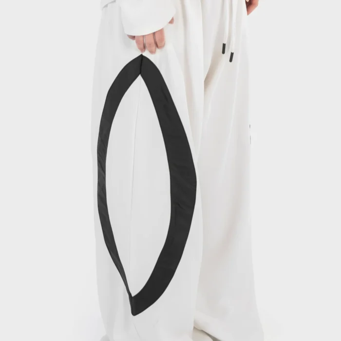 La Curva Motion white pants